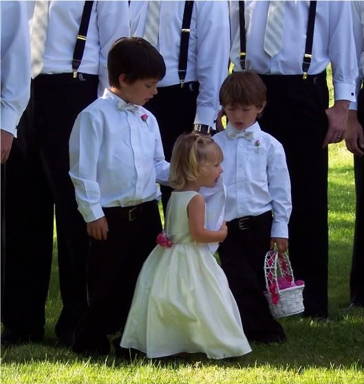 Elly enjoyed playing with the ringbearers pillow throughout the ceremony